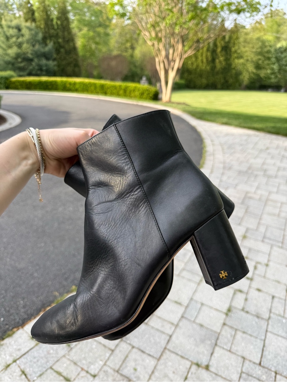 Tory Burch Brooke black leather round-toe booties with a 70mm block heel